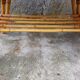 Rattan coffee table with compass legs