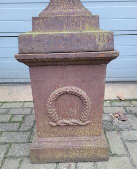 Cast iron garden urn on pedestal with handles