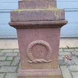 Cast iron garden urn on pedestal with handles