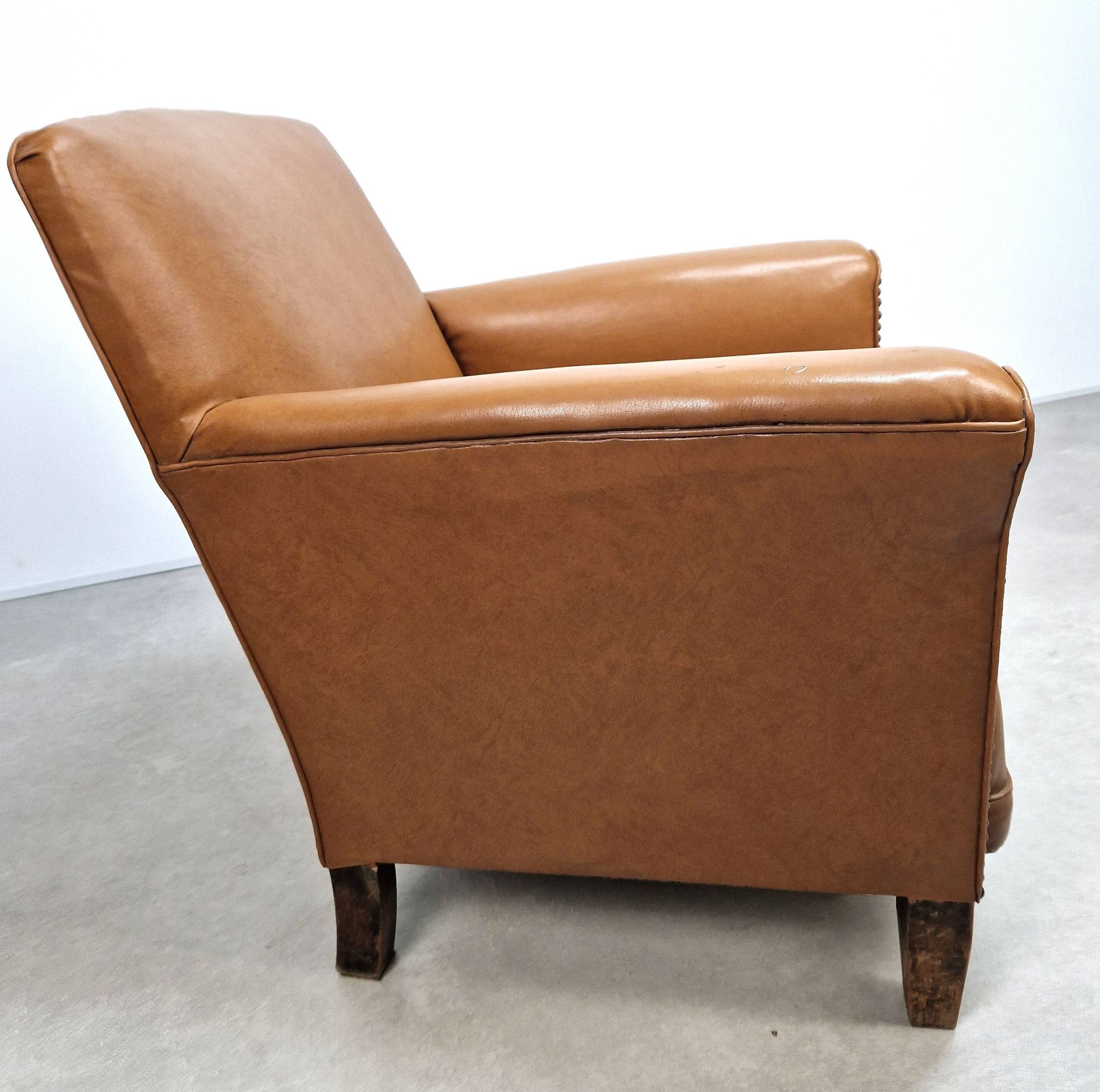 50s club chair in imitation leather and wood