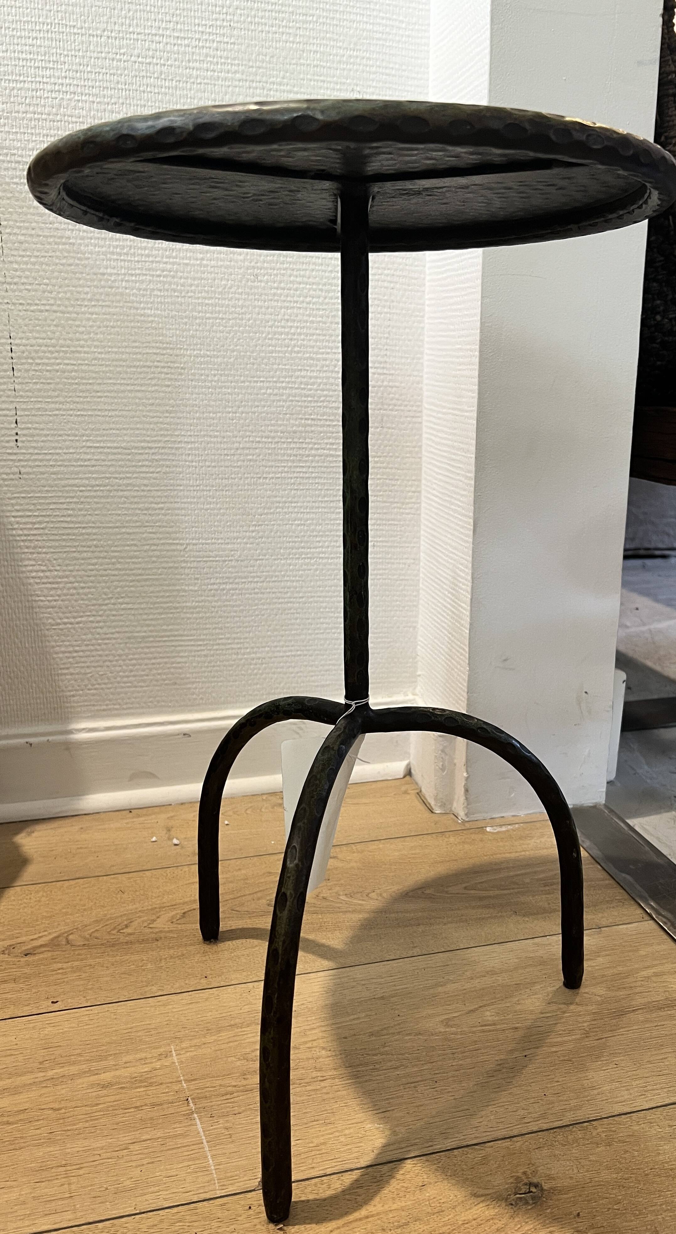 Set of hammered metal tables