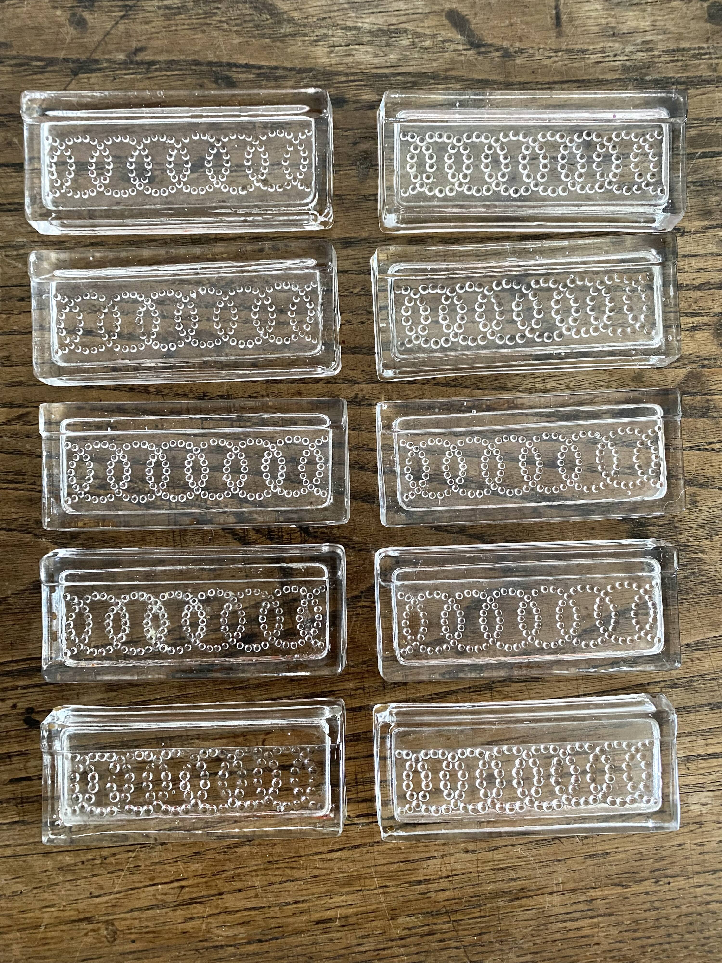 Glass knife holders from the 1950s