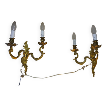 Pair of bronze rocaille style wall lights.
