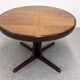 Baumann extendable dining room round table, France circa 1970.