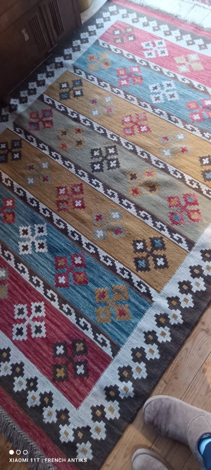 Kazakh oriental rug, vintage kilim from the 1930s. Handcrafted work.