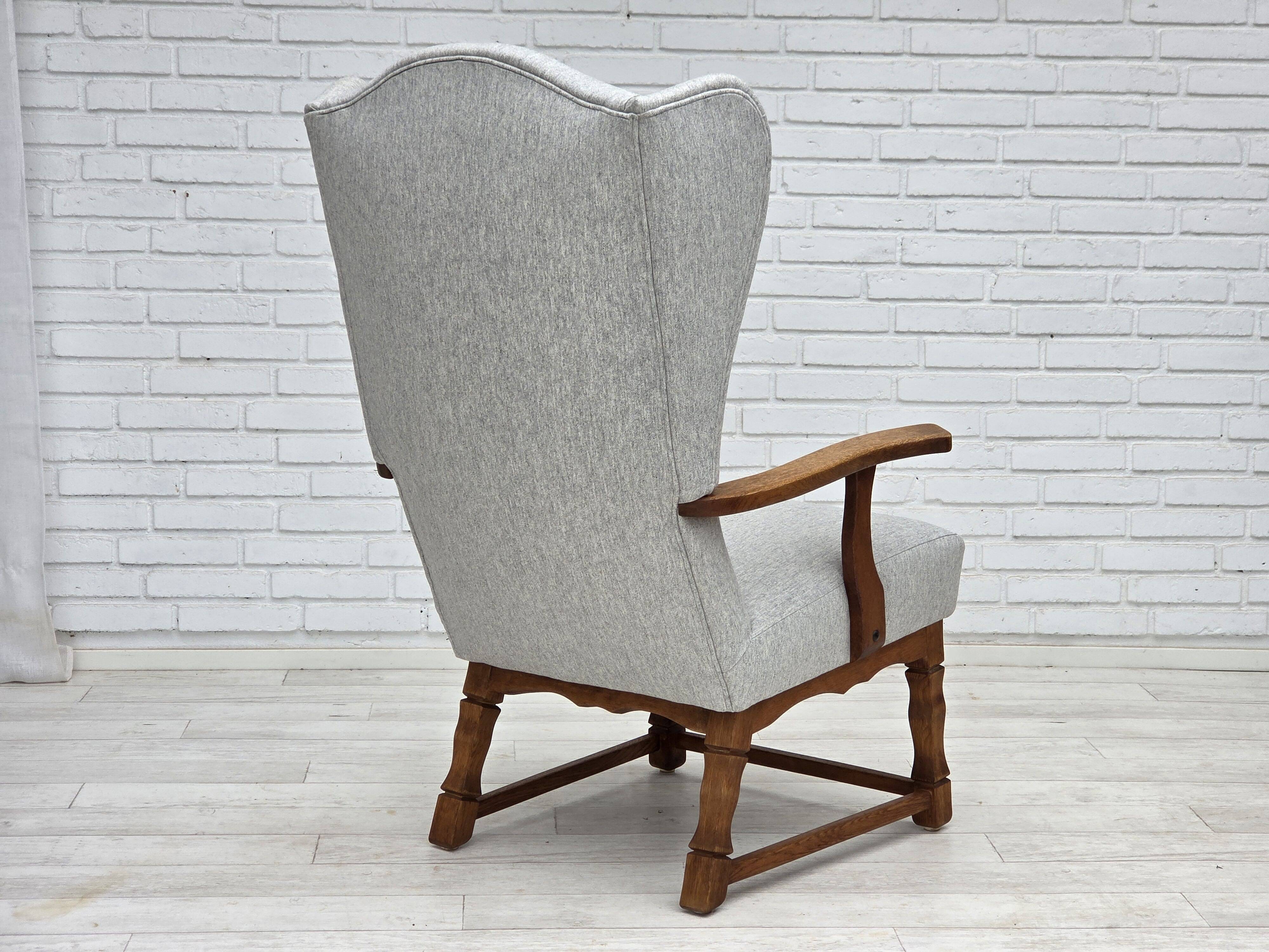 1950s, Danish high-backed armchair, reupholstered, wool, oak wood.