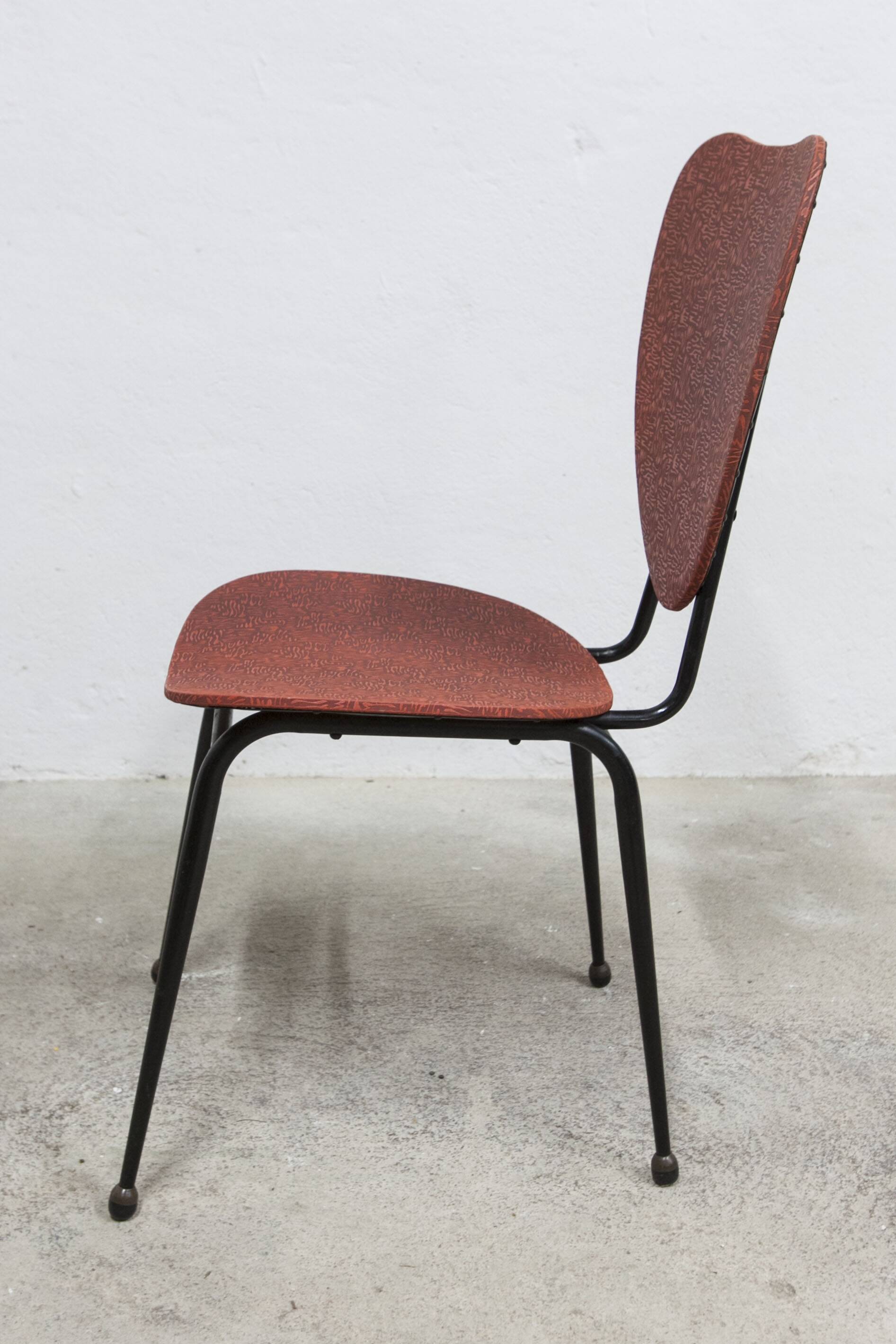 Vintage 70s chair in black lacquered metal and atypical red vinyl