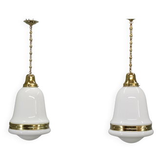 Pair of 1930s Peter Behrens Luzette pendants in opaline glass and brass