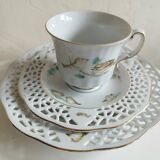 Porcelain cup and cake plate with bird decor
