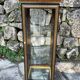 Pair of display cases in magnifying glass and black & gold lacquer, 20th century period