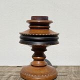 Foot of turned wooden lamp and carved
