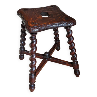 Antique stool in turned and carved solid wood