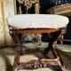 Paire de curules de la fin du xixe en bois sculpté de style Louis xv