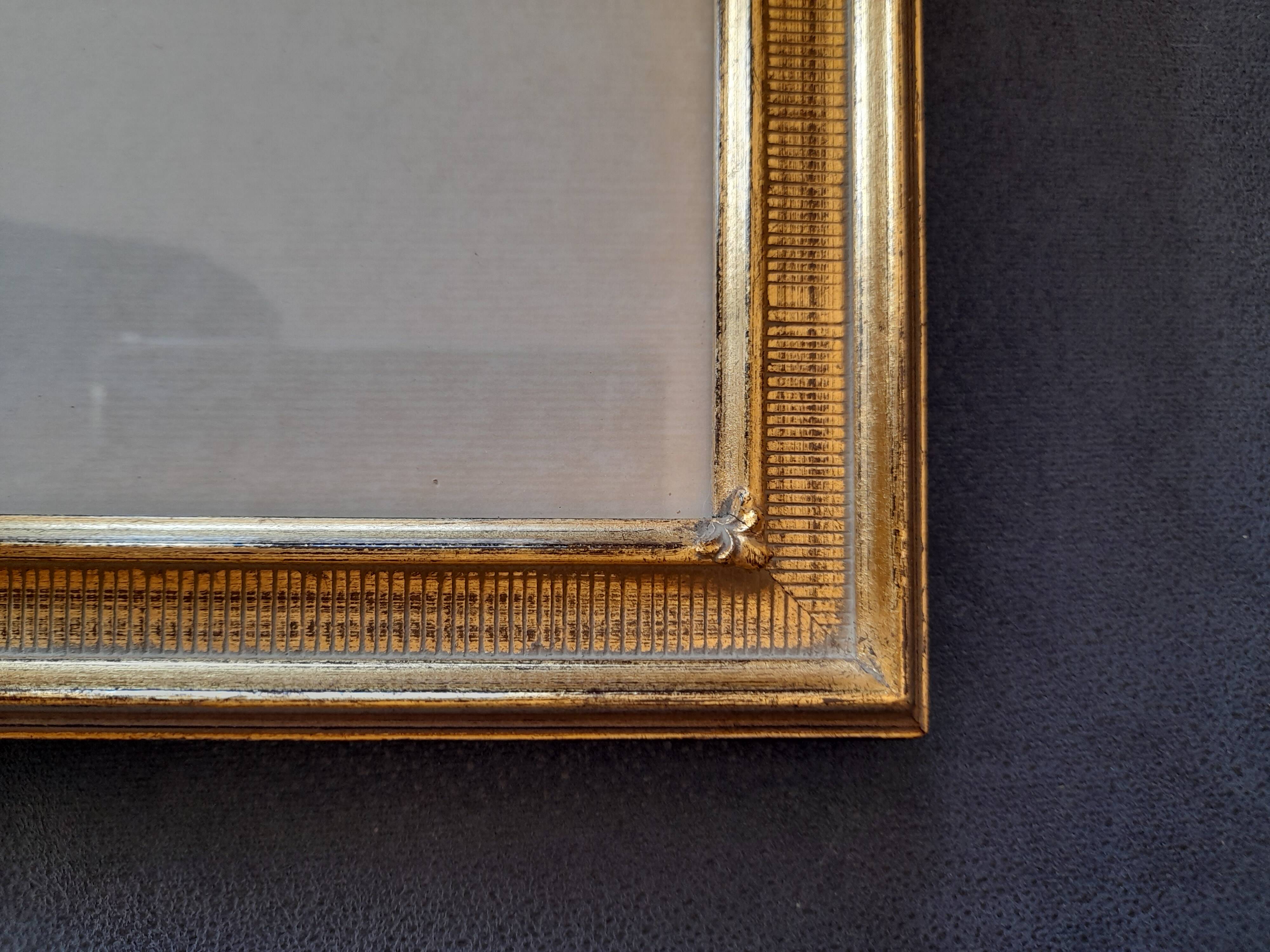 Antique frame with striated gilding