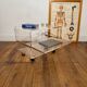 Transparent plexiglass roller table