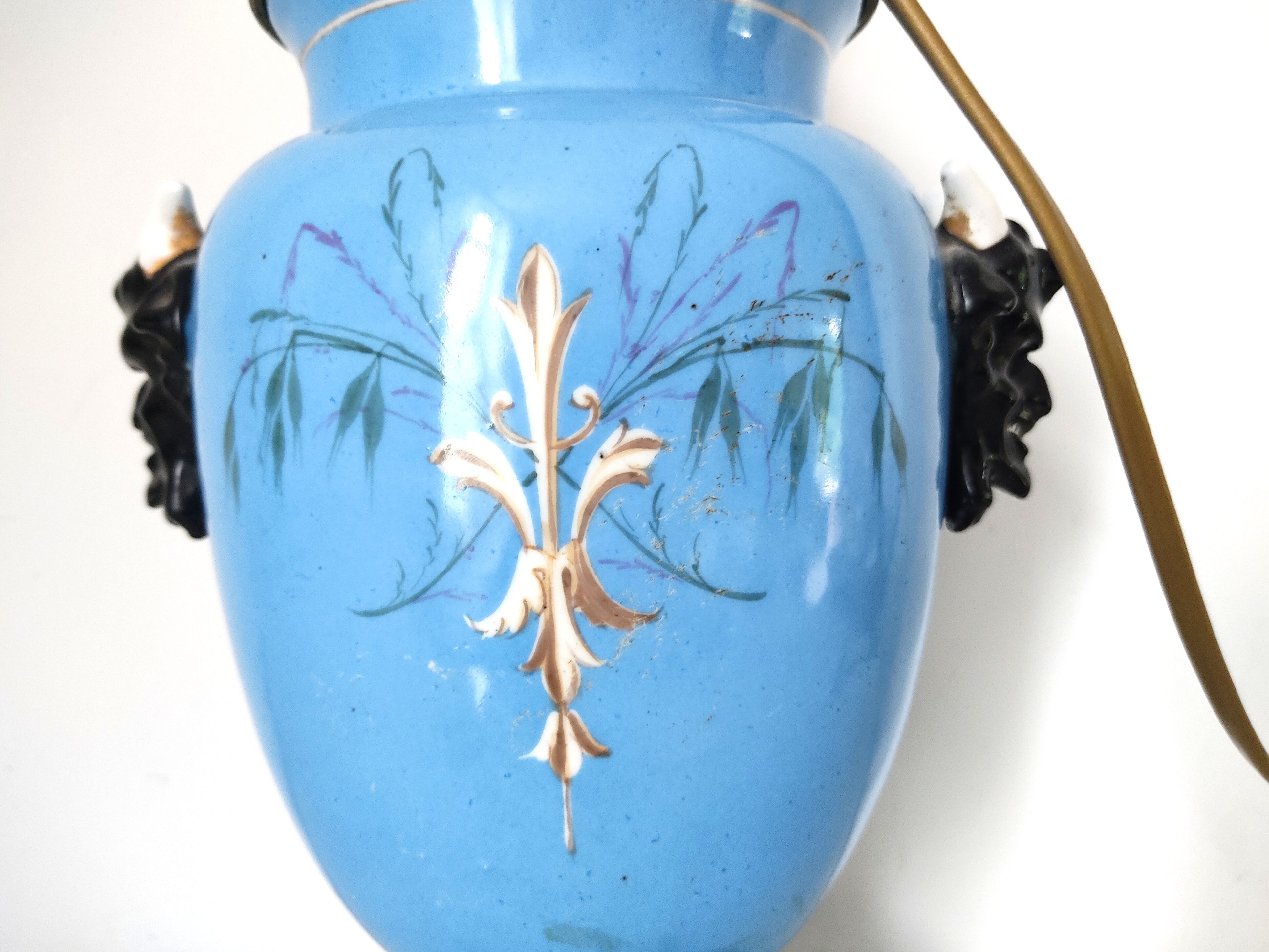 Lamp foot blue vase heads of fauna