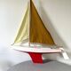 Navigable wooden sailing ship with pretty vintage colors