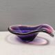 Beautiful dish/bowl in many coloured glass.