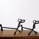 Pair of wrought iron dachshund andirons