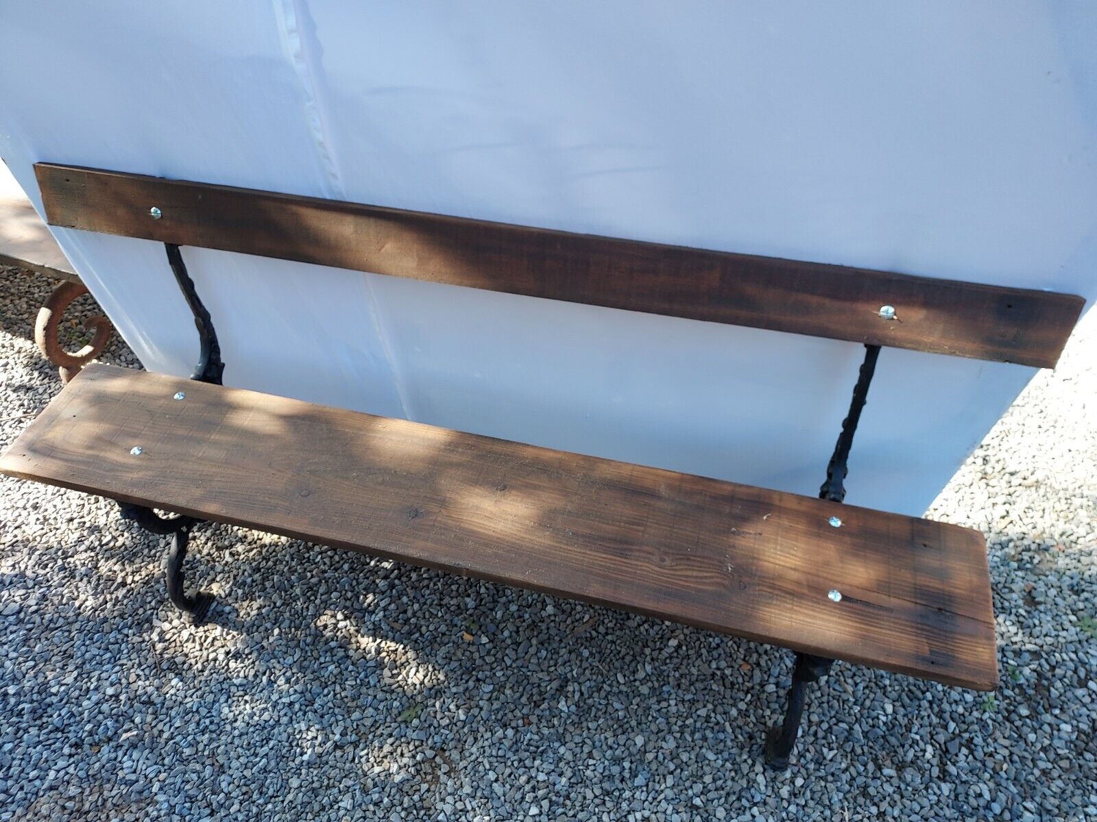 Garden bench in cast iron and wood