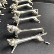 12 animal knife holders in tin