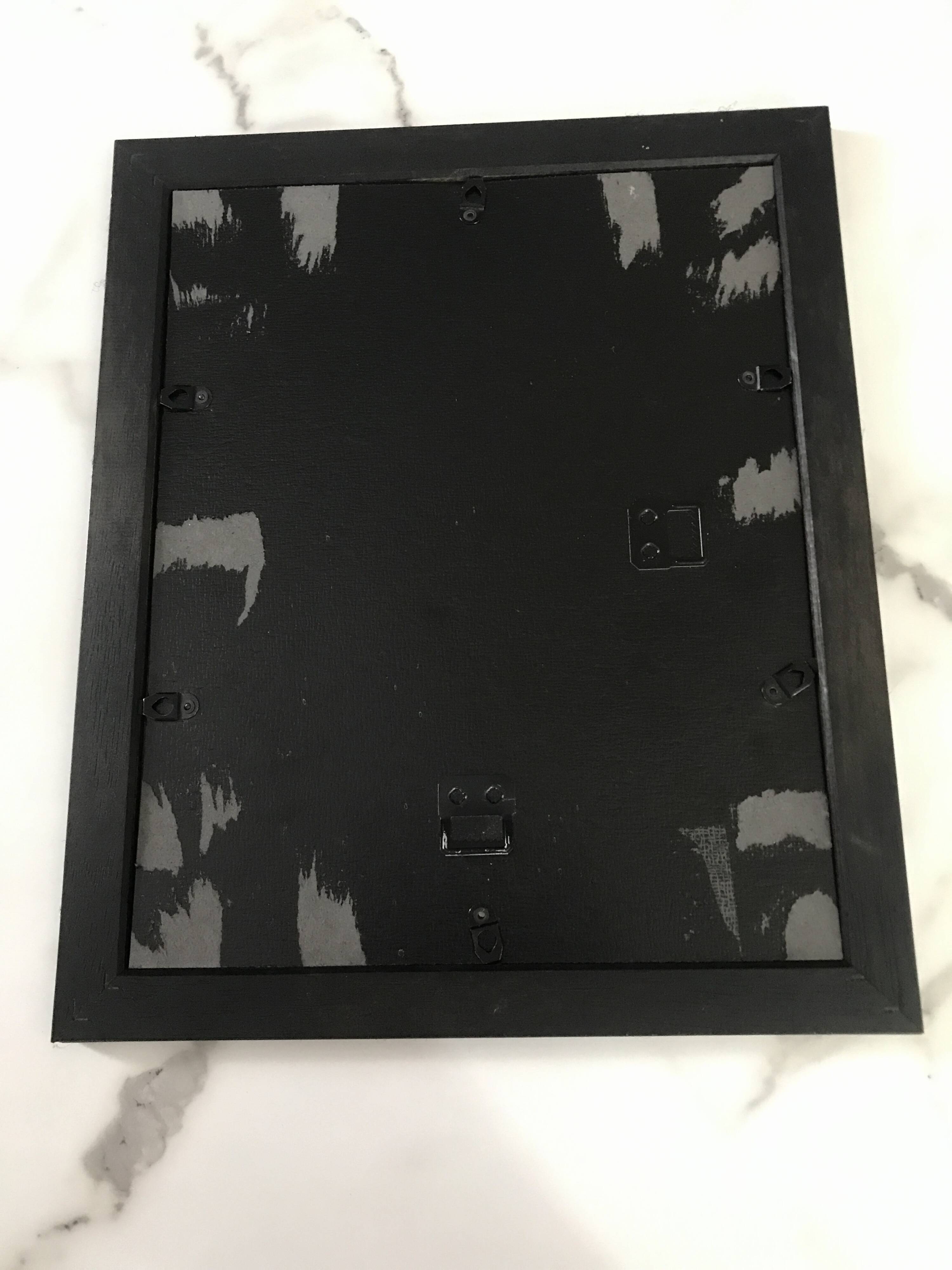 Framed watercolor under wood, signed