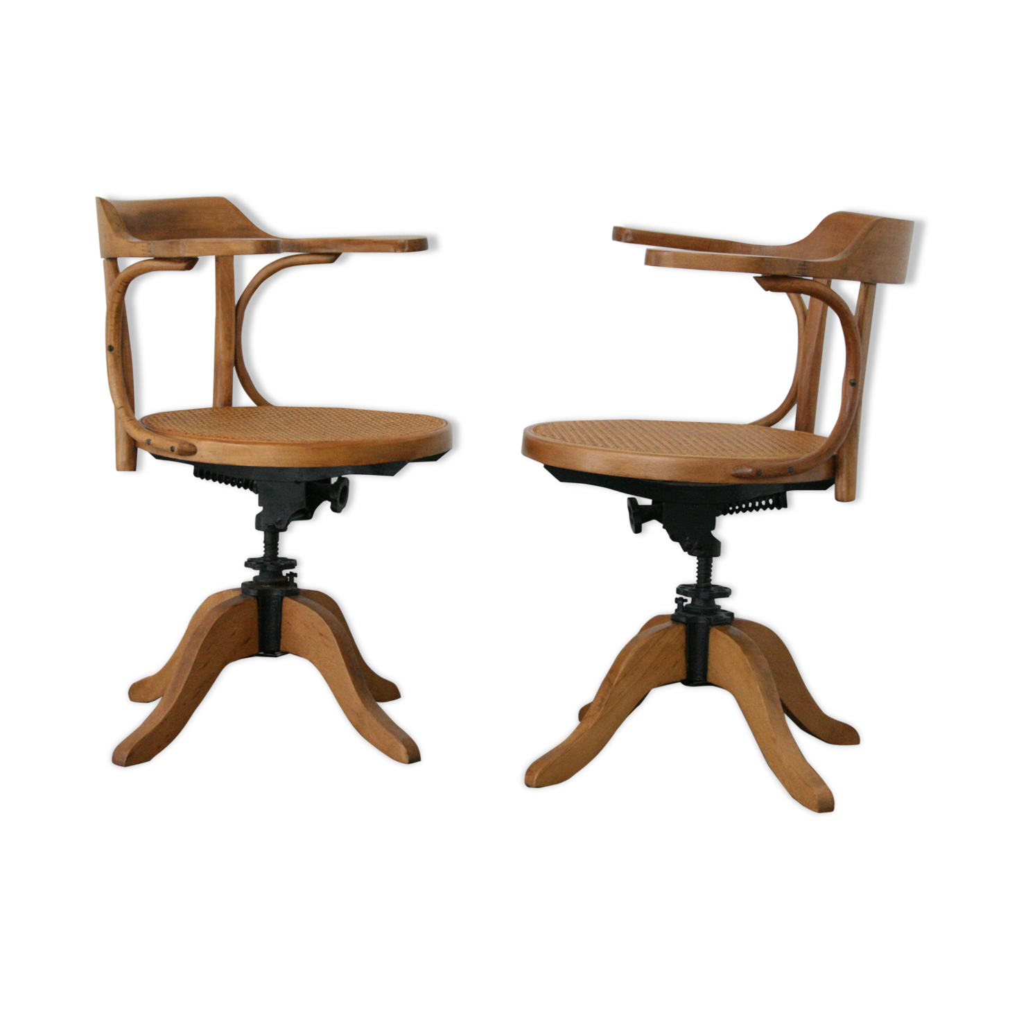 A pair of vintage bent wood svivel chairs by Salvaatore Leone Italy