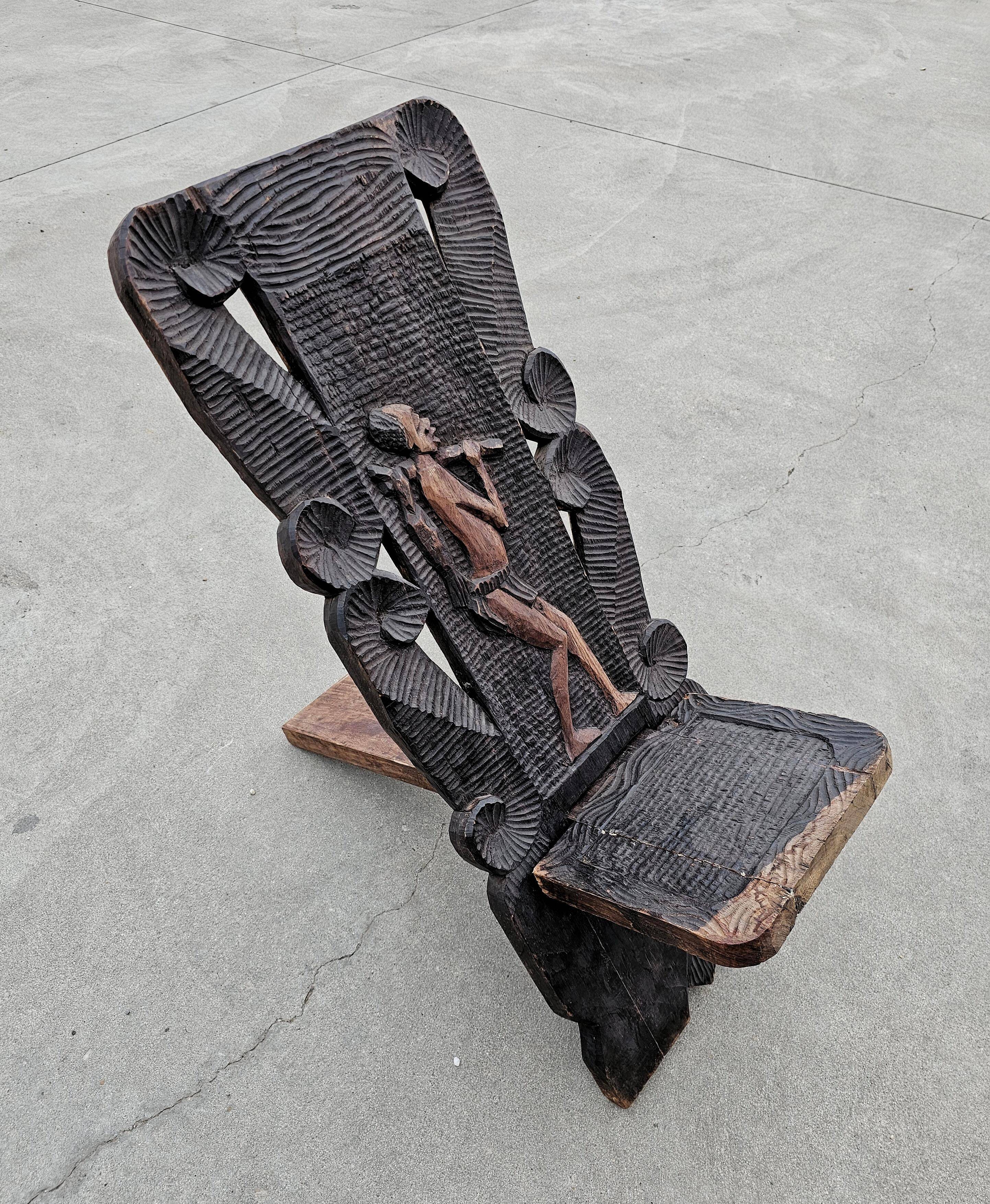 Antique carved wood Stargazer chair from the 1890s.