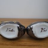 Signed ceramic salt and pepper shaker set
