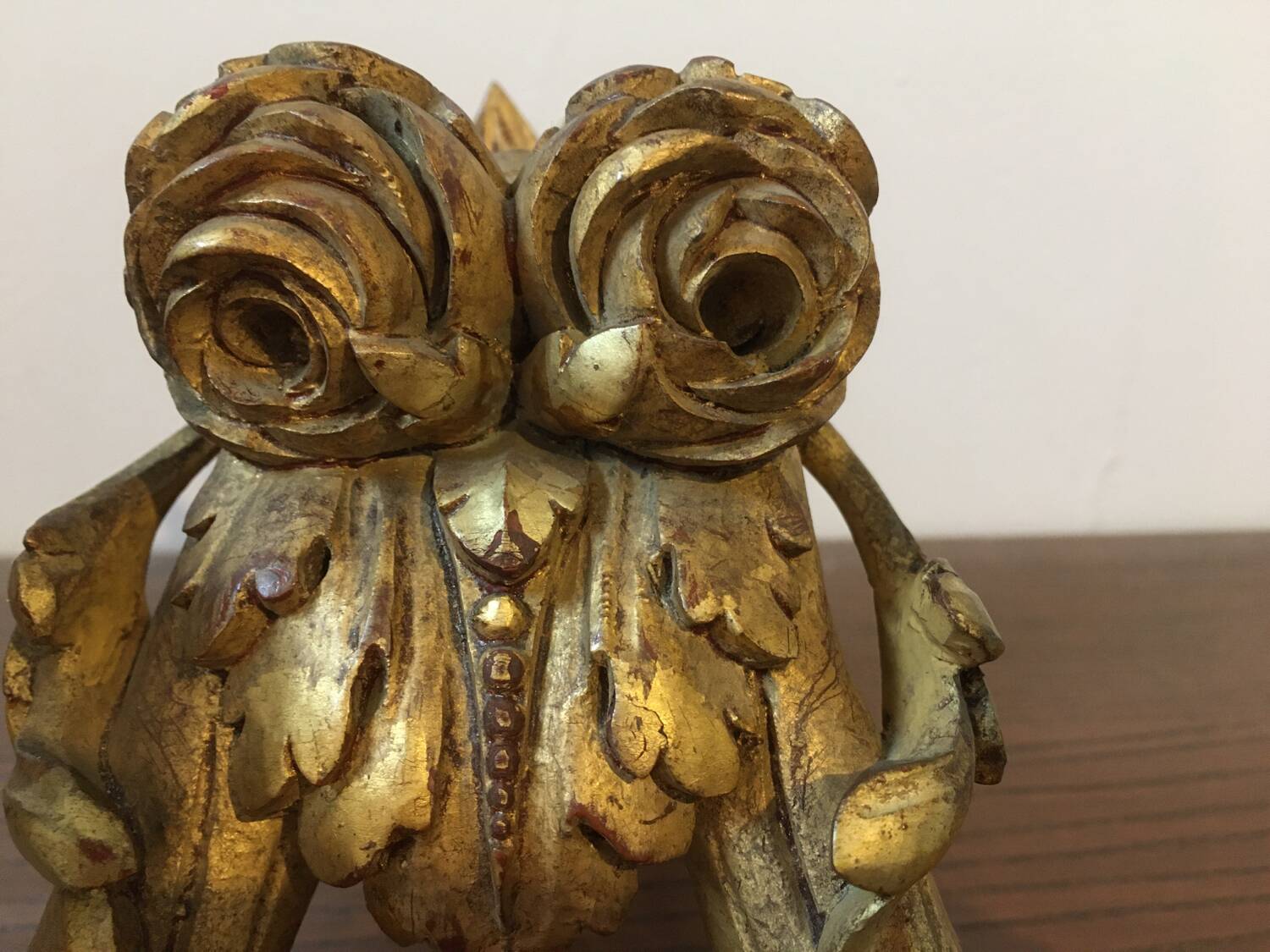 Golden wall candle holder