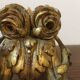 Golden wall candle holder