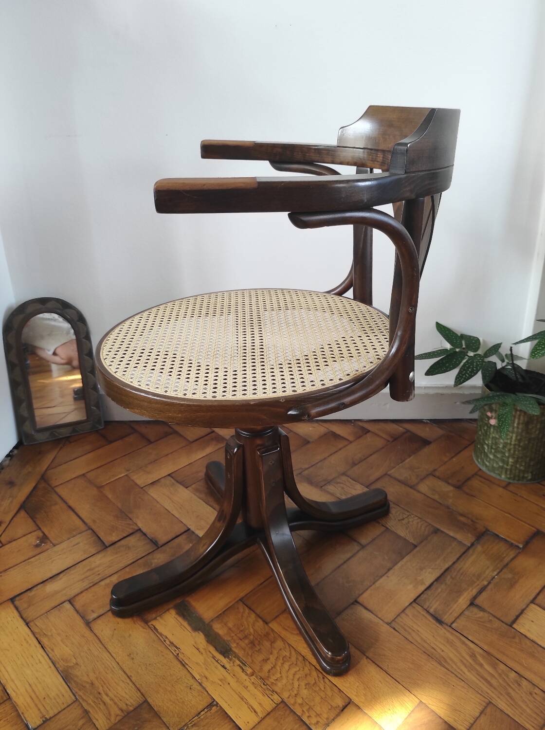 Vintage swivel office chair with curved wood and caning (Thonet style)