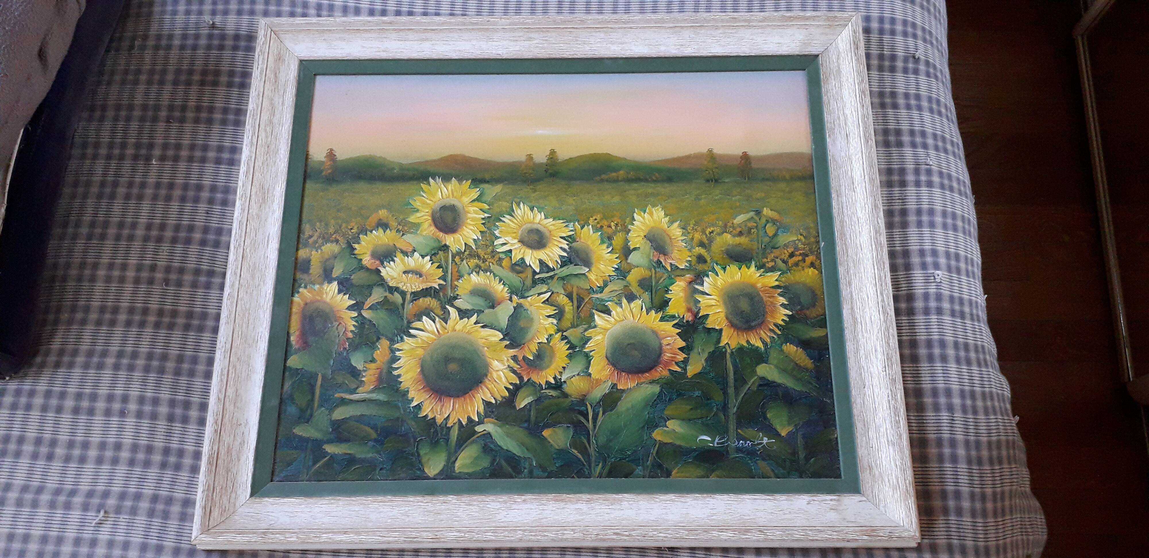 Vintage oil painting depicting a sunflower landscape