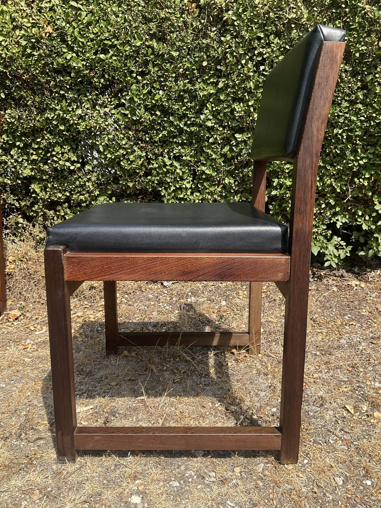Set of 6 vintage teak chairs with black Skaï.