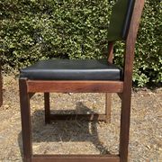Set of 6 vintage teak chairs with black Skaï.