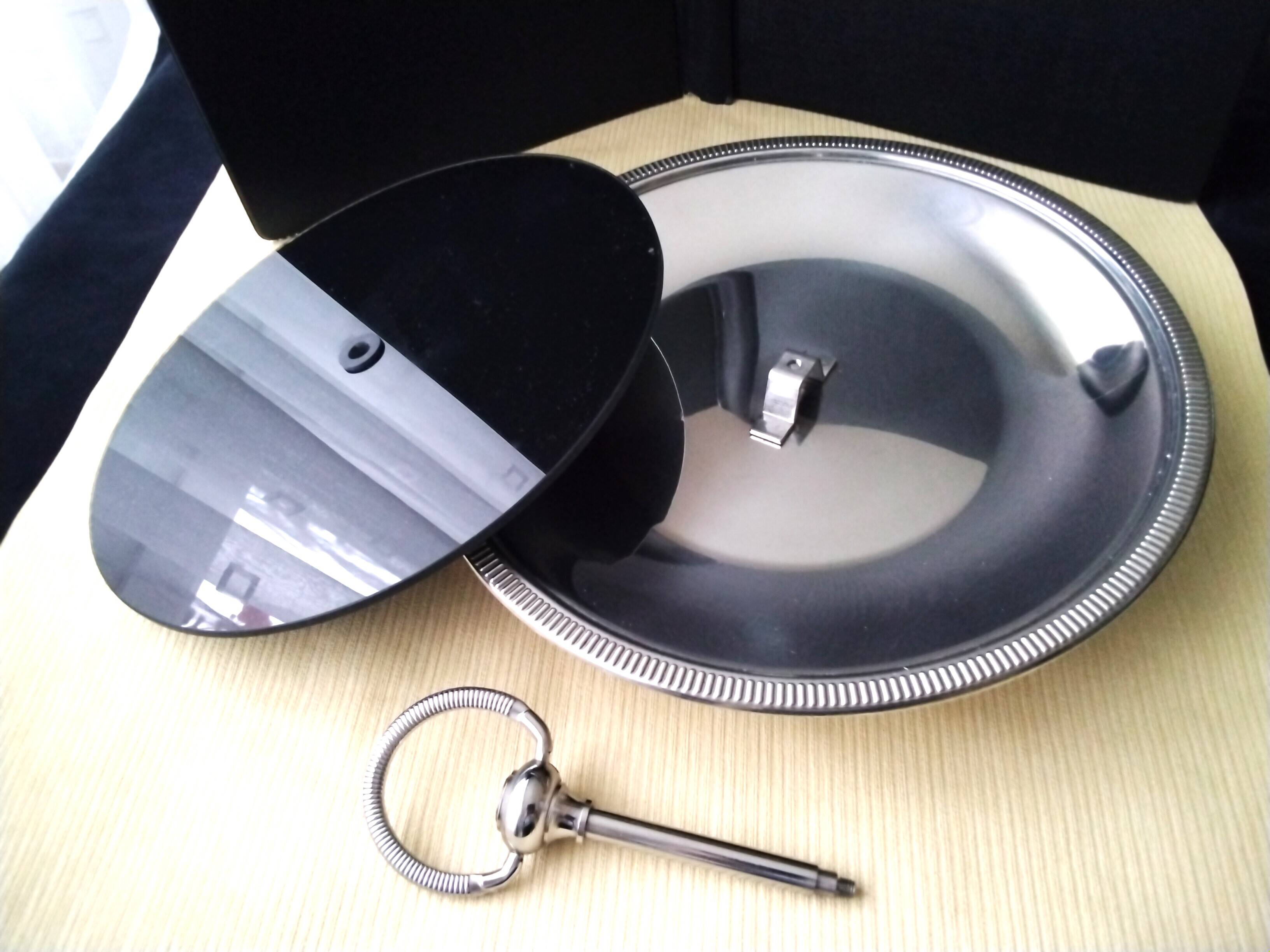 Cheese tray on shower stand in stainless steel and black tinted glass