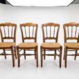 4 rustic farmhouse chairs made of wood and straw