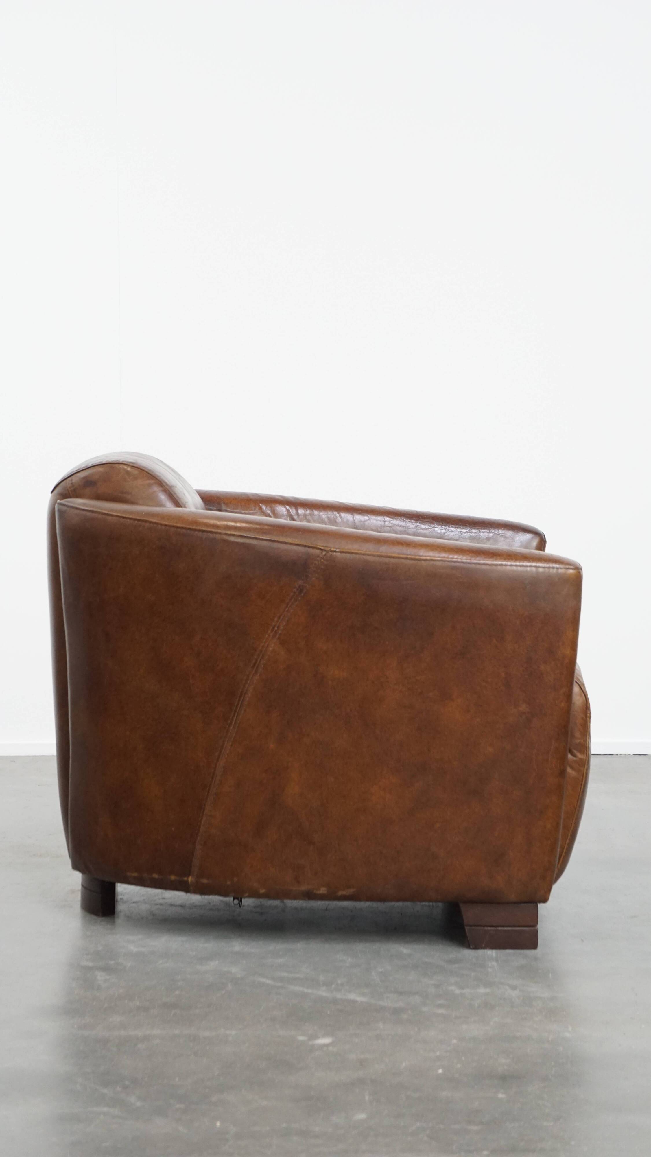 Brown Aviator design armchair made of cowhide leather