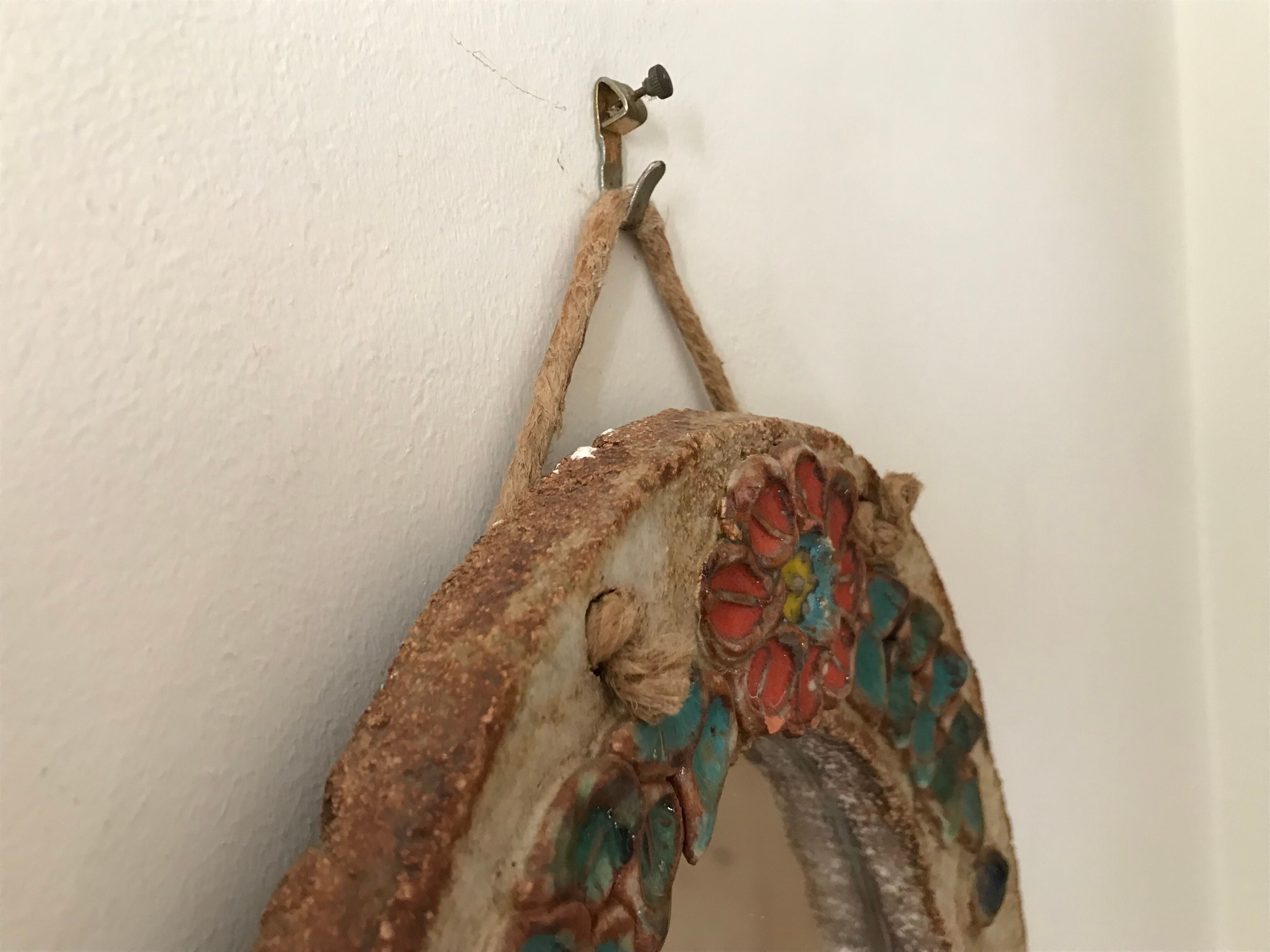 Ceramic mirror decorated with flowers, circa 1960 25x40cm