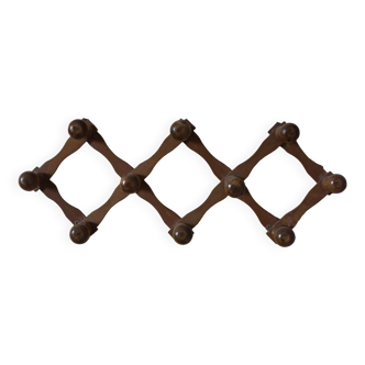 Vintage wooden ball accordion coat rack