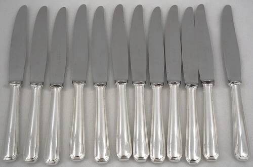 Christofle America, Art Deco 12 silver-plated table knives, excellent condition.