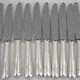 Christofle America, Art Deco 12 silver-plated table knives, excellent condition.