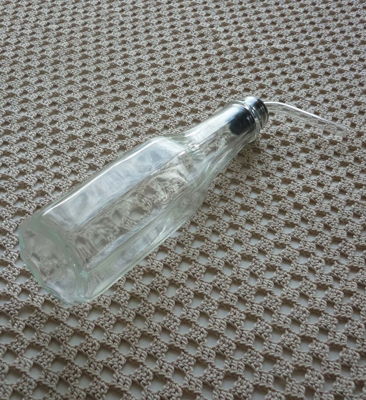Old bottle with glass pipette