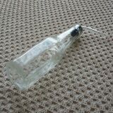 Old bottle with glass pipette