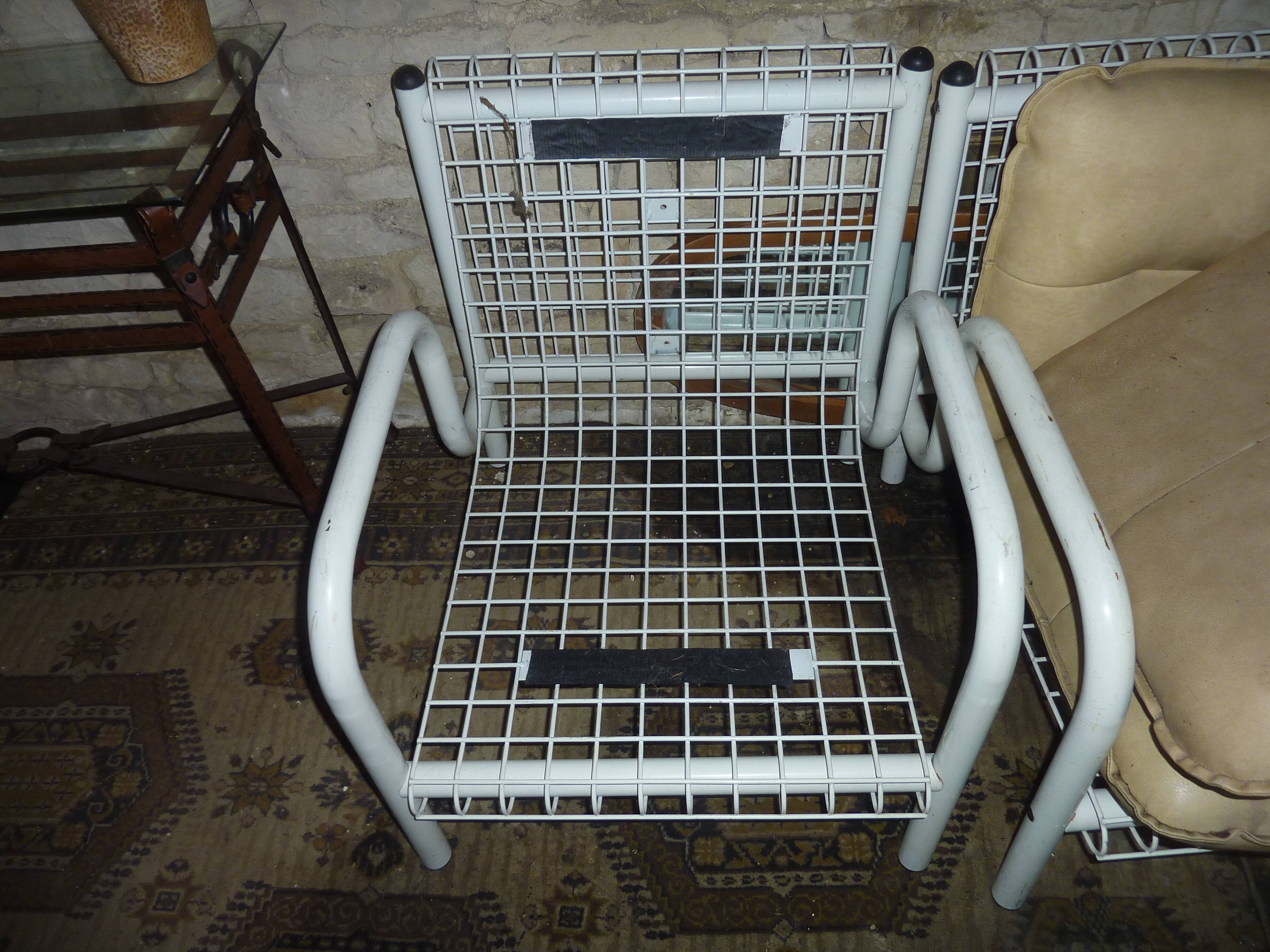 pair of iron armchairs