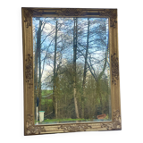 vintage beveled mirror in rectangular shape stucco and gilded wood in Louis XV baroque style