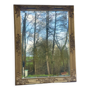 vintage bevelled mirror in rectangular shape, stucco and gilded wood in Louis XV baroque style