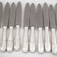 Boulenger Rambouillet 12 dessert, cheese, and fruit knives in silver-plated metal.