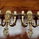 Paire d'appliques en bronze massif doré.