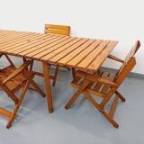 Vintage garden furniture set consisting of a table with extensions and 4 armchairs